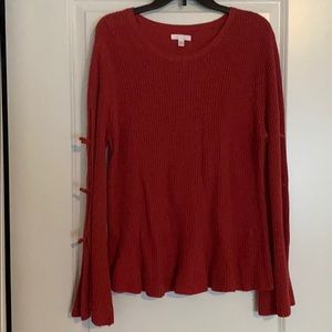 Fashion sweater with tie sleeves